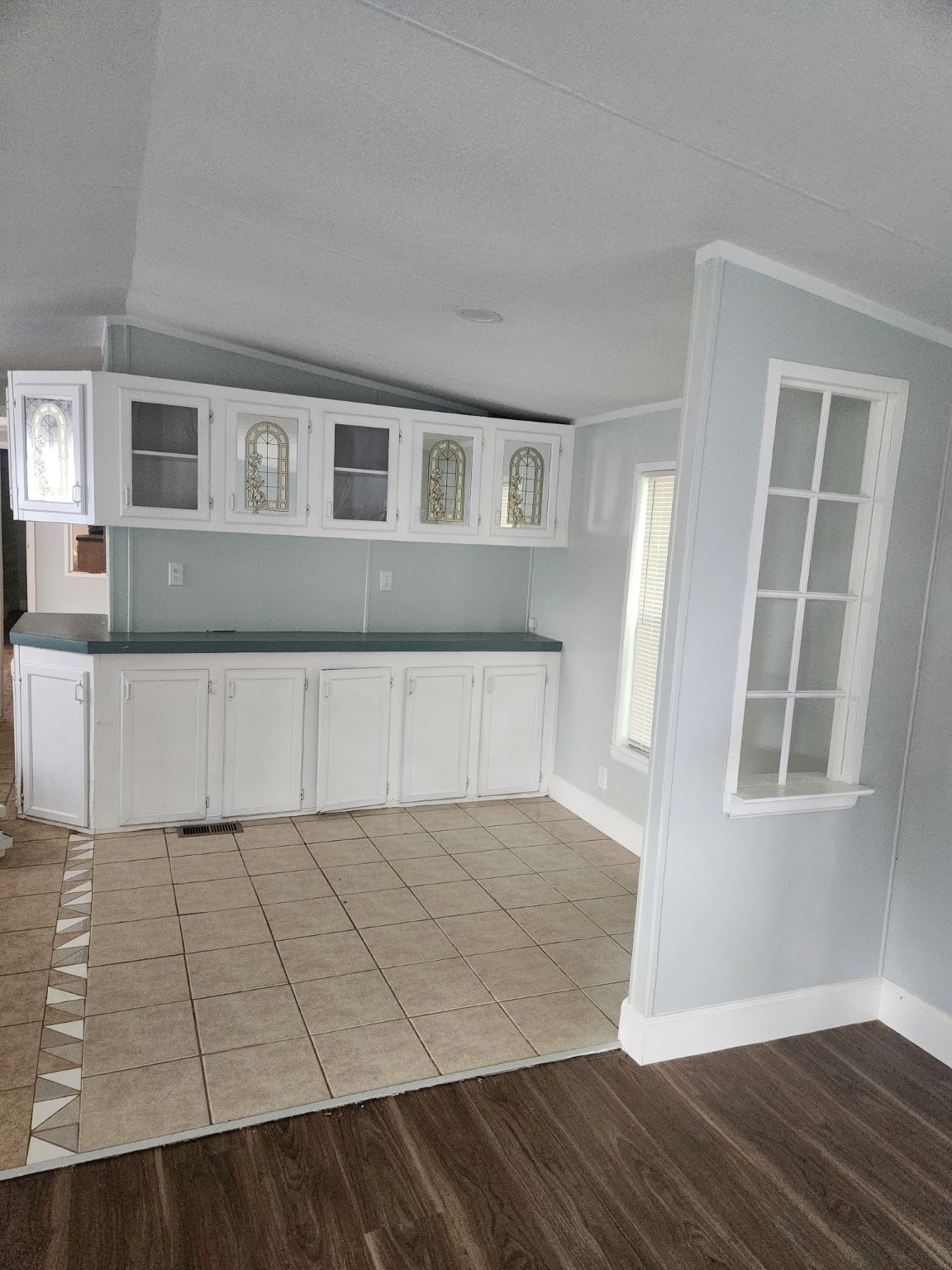 3614 Cedar Street, Unit C264R Damon, TX 77430 - Photo 7 of 7 an empty room with wooden floor and windows