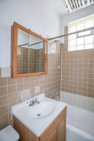 a bathroom with a sink and a bathtub