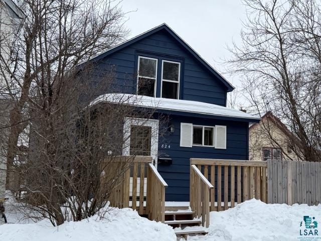 824 12th Street North Virginia, MN 55792 - Photo 1 of 34 View of front of home featuring a wooden deck