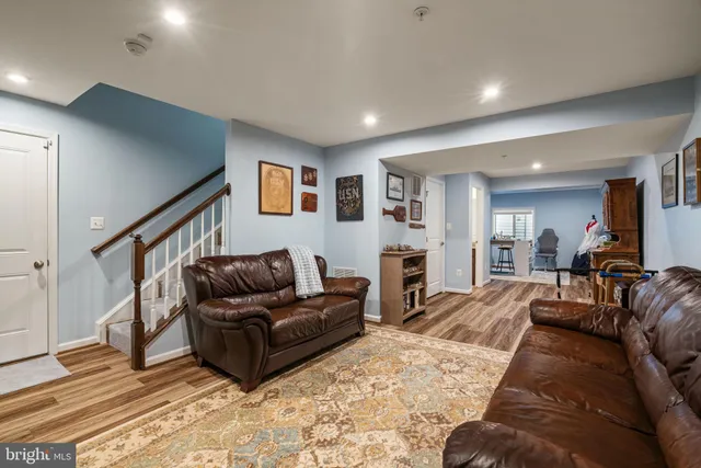 a bathroom with a shower a toilet and a shower