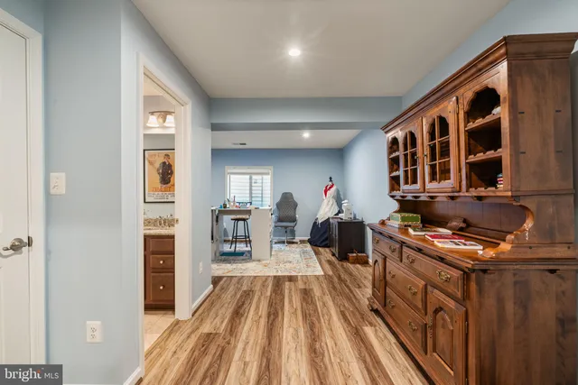 a view of a table and chairs in the garden