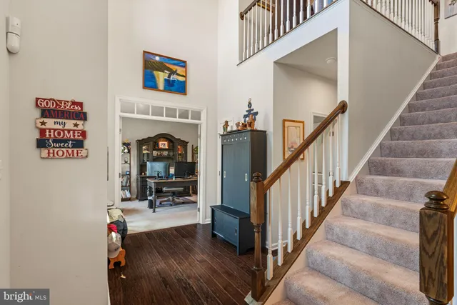 a view of a workspace with furniture