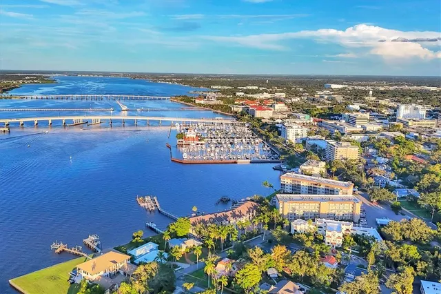 a view of a street with a building in the background
