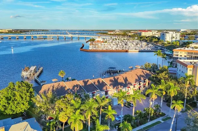 a view of an entryway with wooden floor and stairs
