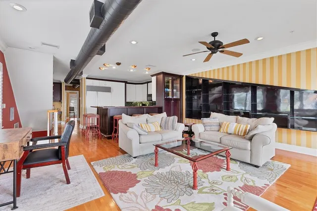 a kitchen with a stove a sink and a refrigerator