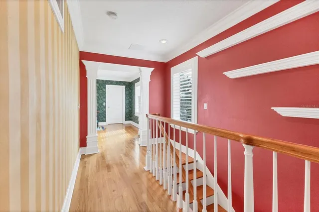 a view of a patio with table and chairs
