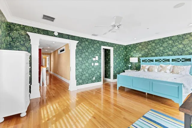 a view of a two chairs in the balcony