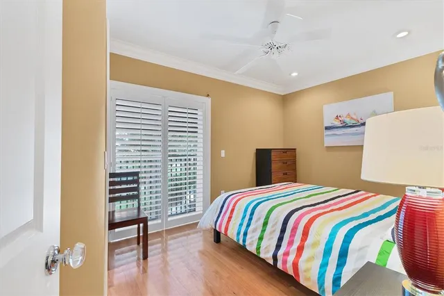 a bathroom with a shower a toilet and a sink