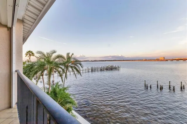 a view of swimming pool outdoor seating and garden