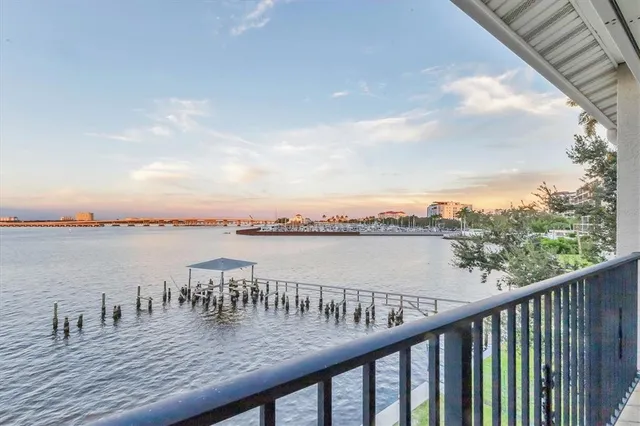 a view of a terrace with a garden and seating area
