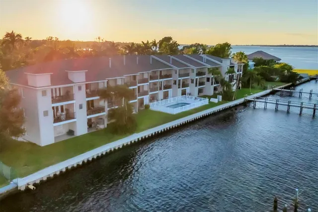 a view of a balcony with chairs