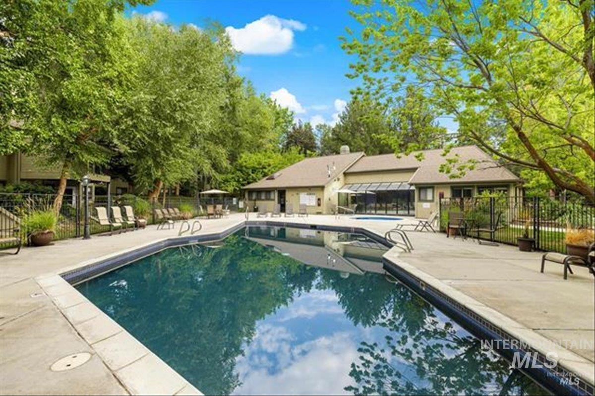 3611 South Gekeler Lane, Unit 124 Boise, ID 83706 - Photo 20 of 27 Community pool featuring a patio area