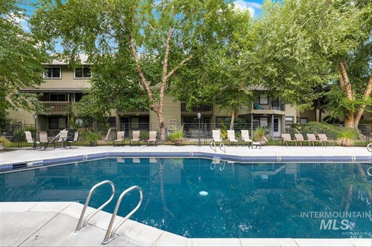 3611 South Gekeler Lane, Unit 124 Boise, ID 83706 - Photo 22 of 27 Community pool featuring a patio area