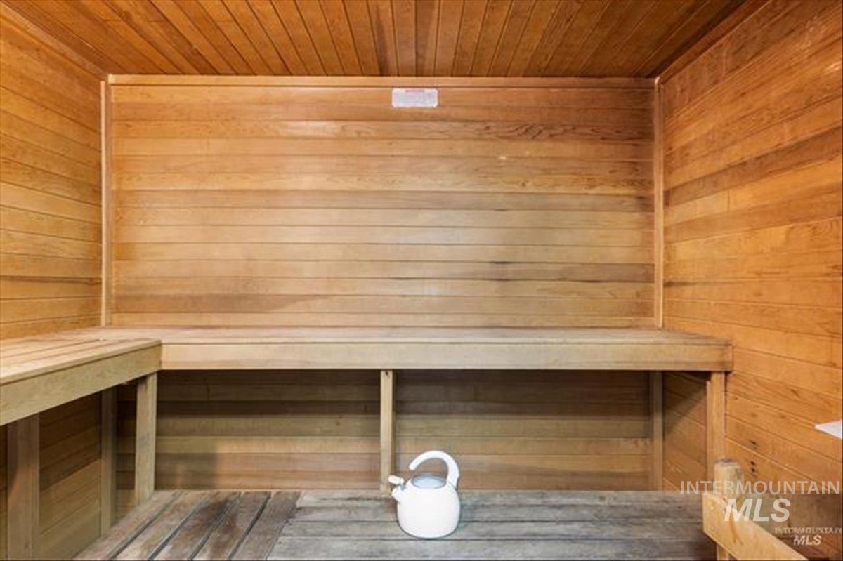 3611 South Gekeler Lane, Unit 124 Boise, ID 83706 - Photo 24 of 27 Relaxing sauna / steam room featuring wooden walls and wood ceiling