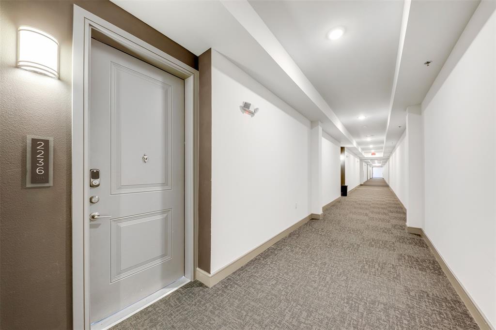 2700 Old Denton Road, Unit 2236 Carrollton, TX 75007 - Photo 20 of 23 a view of hallway with stairs