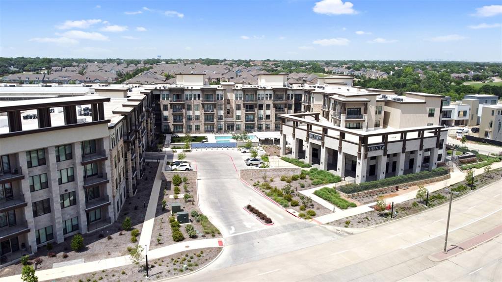 2700 Old Denton Road, Unit 2236 Carrollton, TX 75007 - Photo 21 of 23 a view of a city that has lawn chairs