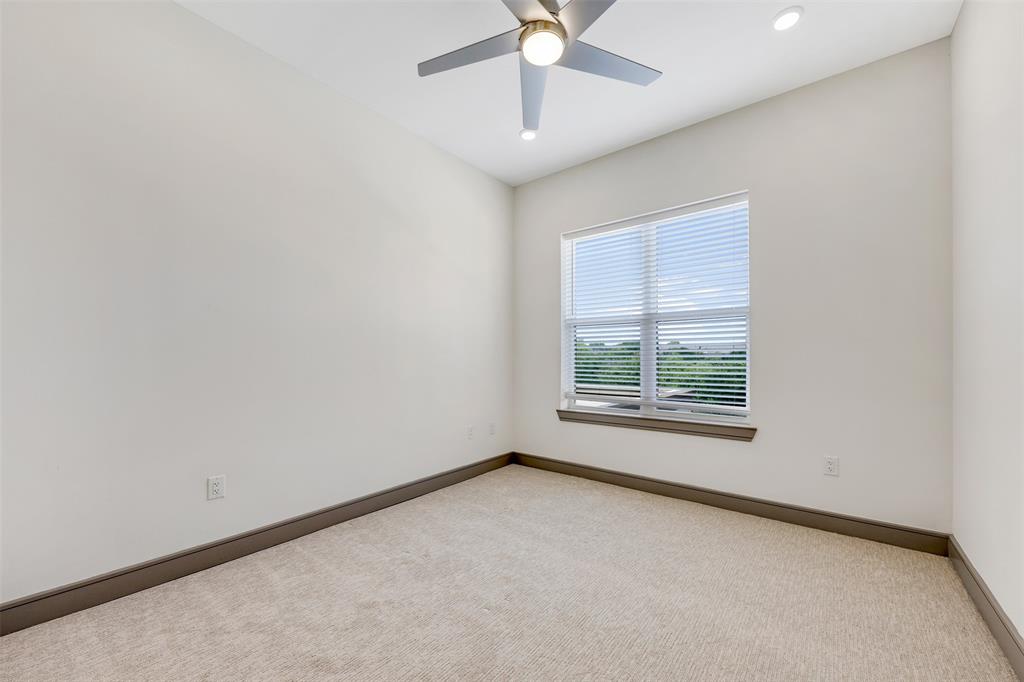 2700 Old Denton Road, Unit 2236 Carrollton, TX 75007 - Photo 10 of 23 an empty room with a window and a fan