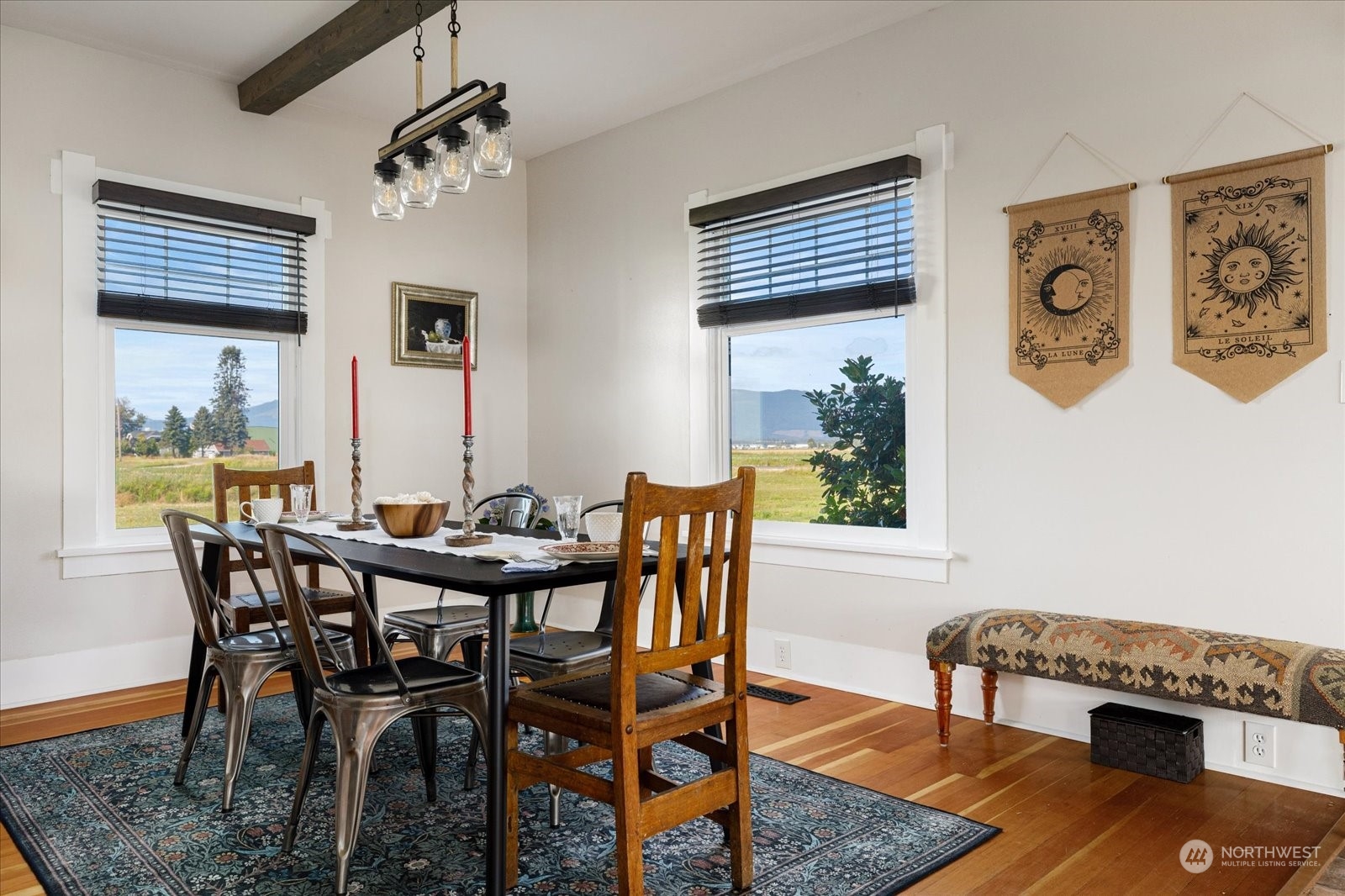 11602 Pulver Road Burlington, WA 98233 - Photo 9 of 40 a view of a dining room with furniture window and wooden floor