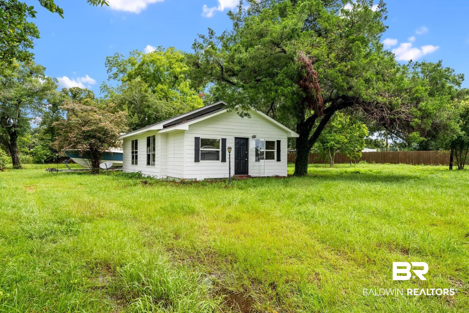 19575 Keller Road Foley, AL 36535 - Photo 2 of 17 View of front of house with view of wooded area