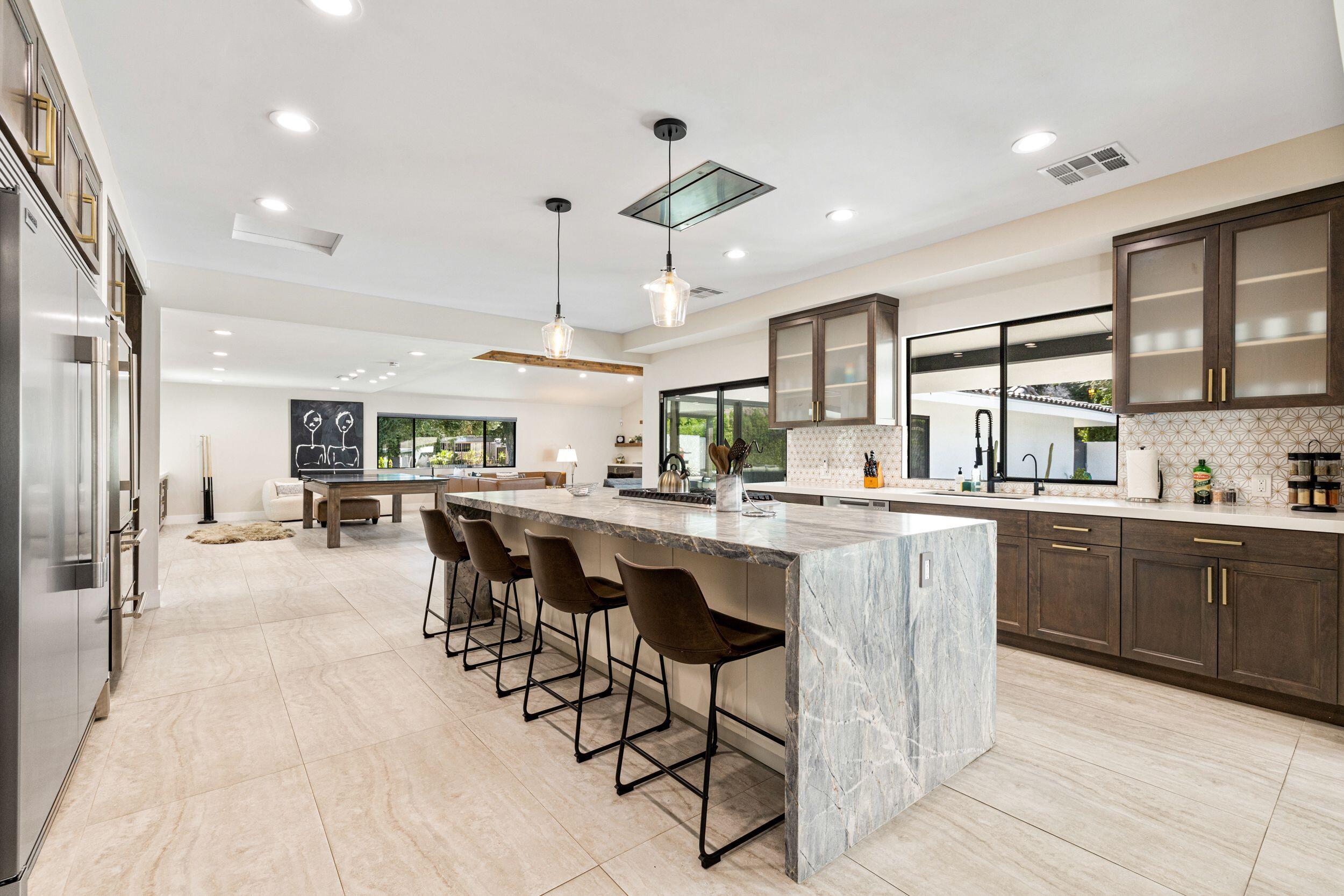45655 Apache Road Indian Wells, CA 92210 - Photo 6 of 31 7. Kitchen Marble Island with Bar Seatin
