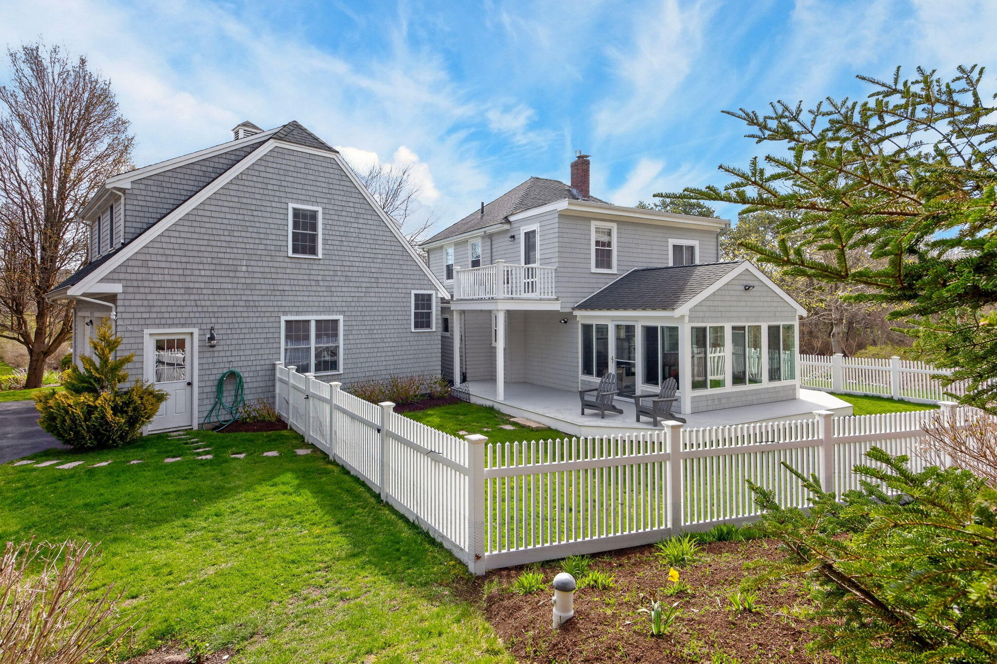 1 Peaked Cliff Road Sagamore Beach, MA 02562 - Photo 59 of 80 a front view of house with yard and trees in the background