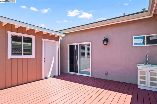 a view of a house with wooden floor and a window