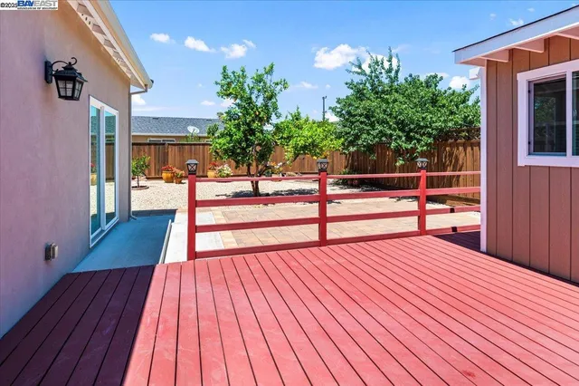 swimming pool view with a seating space