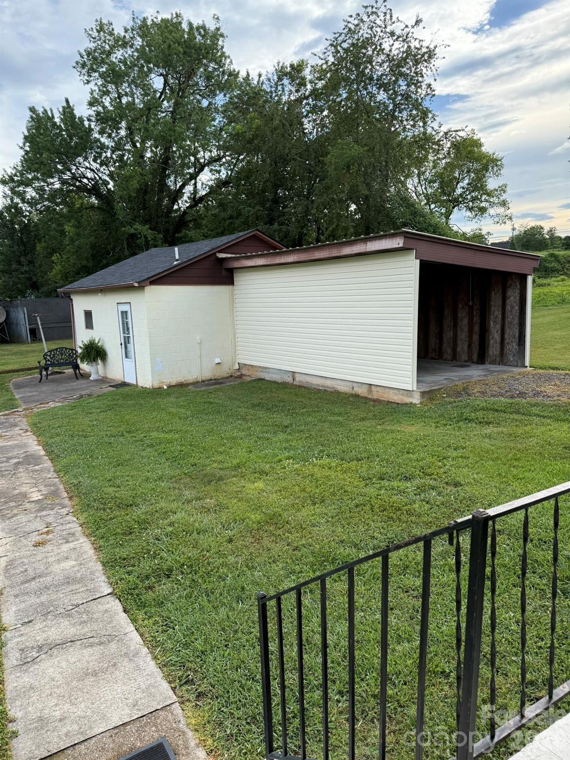 108 Fletcher Street Morganton, NC 28655 - Photo 20 of 29 a view of a backyard with a garden