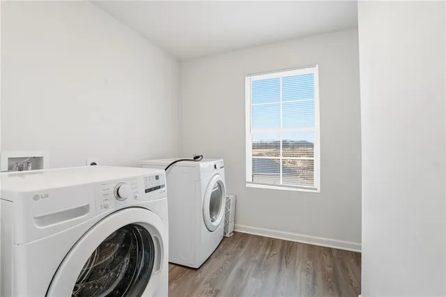 a utility room with dryer and washer