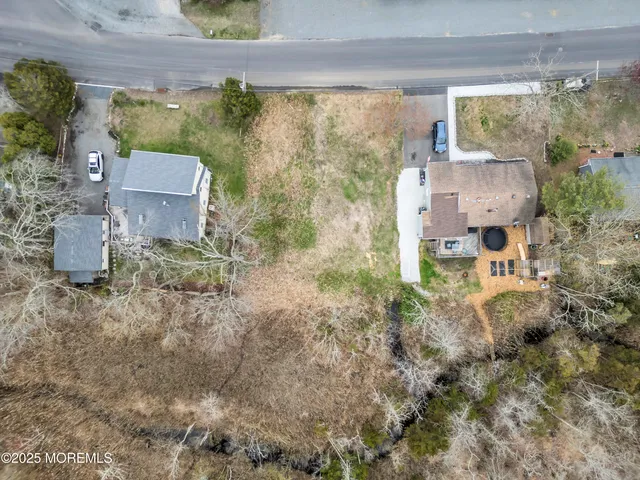 aerial view of a house with outdoor space
