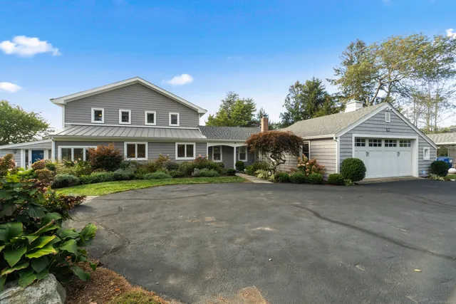 a view of a chairs and table in the patio