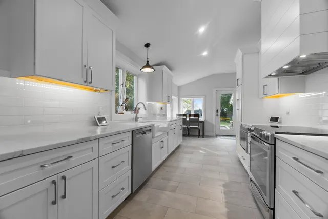 a large kitchen with cabinets