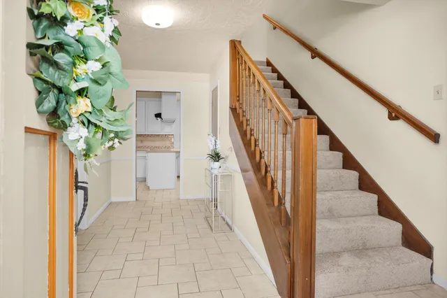 a view of entryway with wooden floor