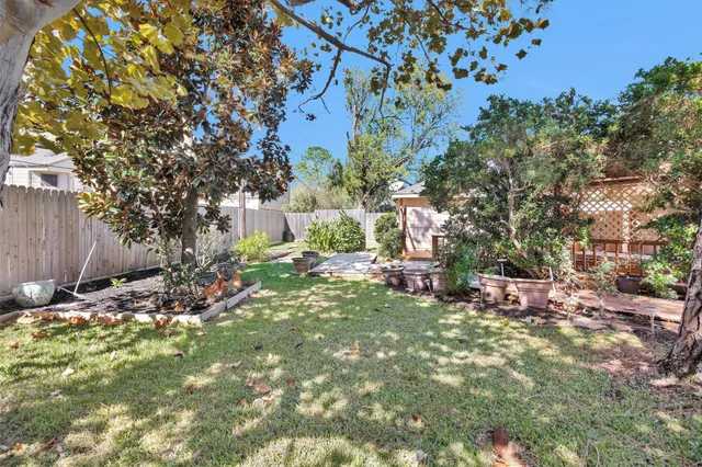 a view of a house with a yard porch and sitting area