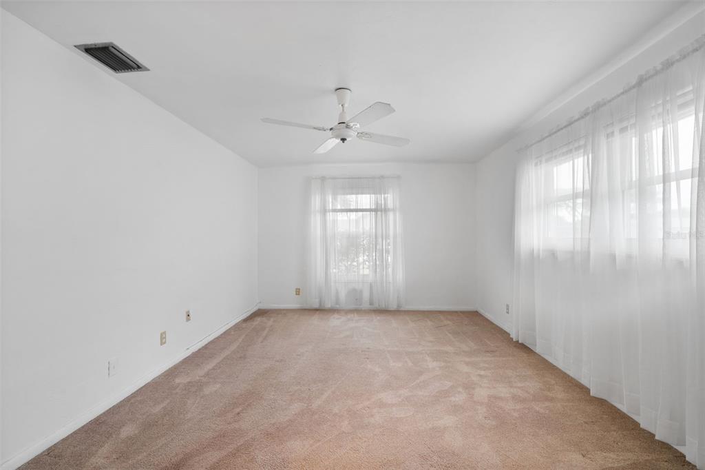 1540 Northwest 10th Street Boca Raton, FL 33486 - Photo 18 of 38 wooden floor in an empty room with a window