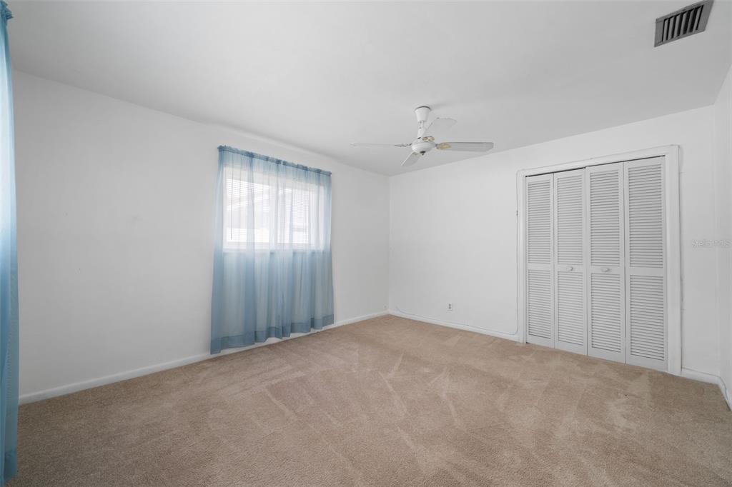 1540 Northwest 10th Street Boca Raton, FL 33486 - Photo 25 of 38 a view of an empty room with a window