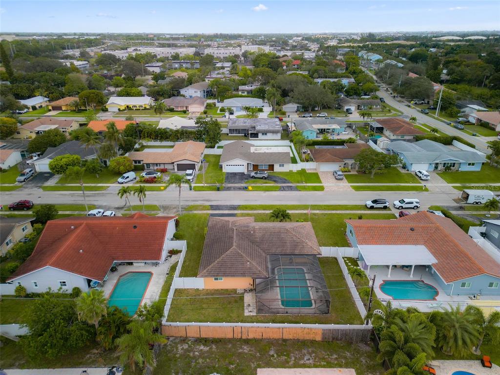 1540 Northwest 10th Street Boca Raton, FL 33486 - Photo 33 of 38 an aerial view of residential houses with outdoor space