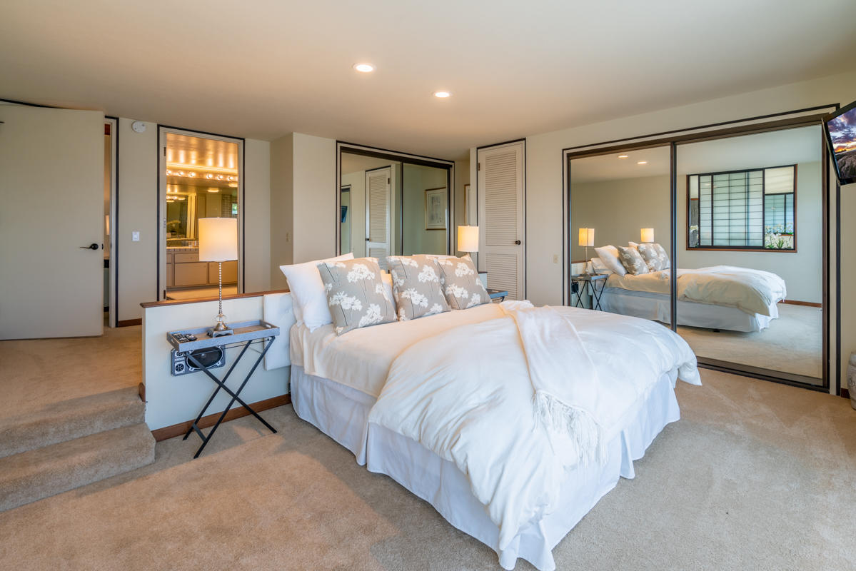350 Las Alturas Road Santa Barbara, CA 93103 - Photo 11 of 49 a bedroom with a large bed and windows