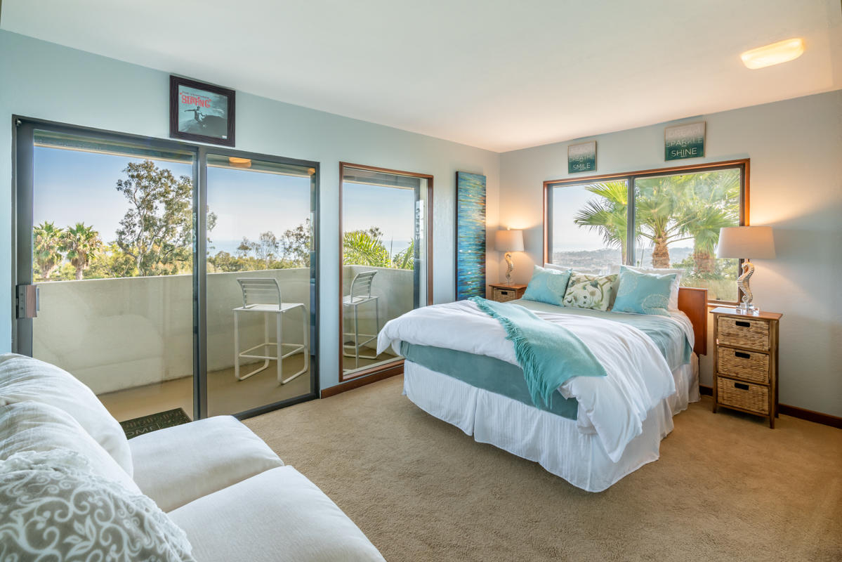 350 Las Alturas Road Santa Barbara, CA 93103 - Photo 15 of 49 a bedroom with a large bed and a window