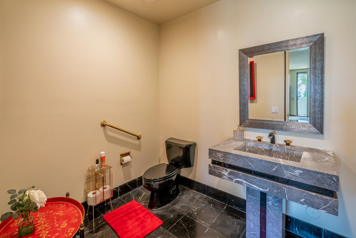 350 Las Alturas Road Santa Barbara, CA 93103 - Photo 25 of 49 a bathroom with a sink and a mirror