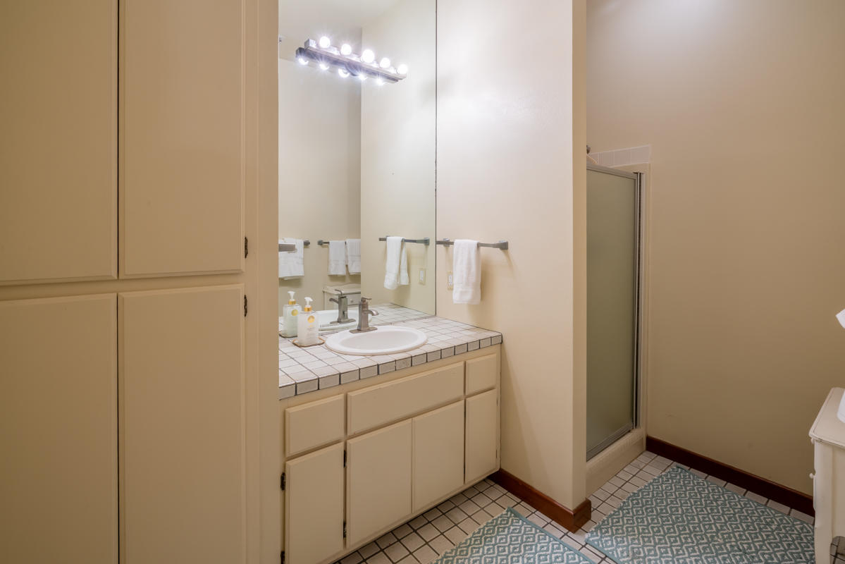 350 Las Alturas Road Santa Barbara, CA 93103 - Photo 26 of 49 a bathroom with a sink and a mirror