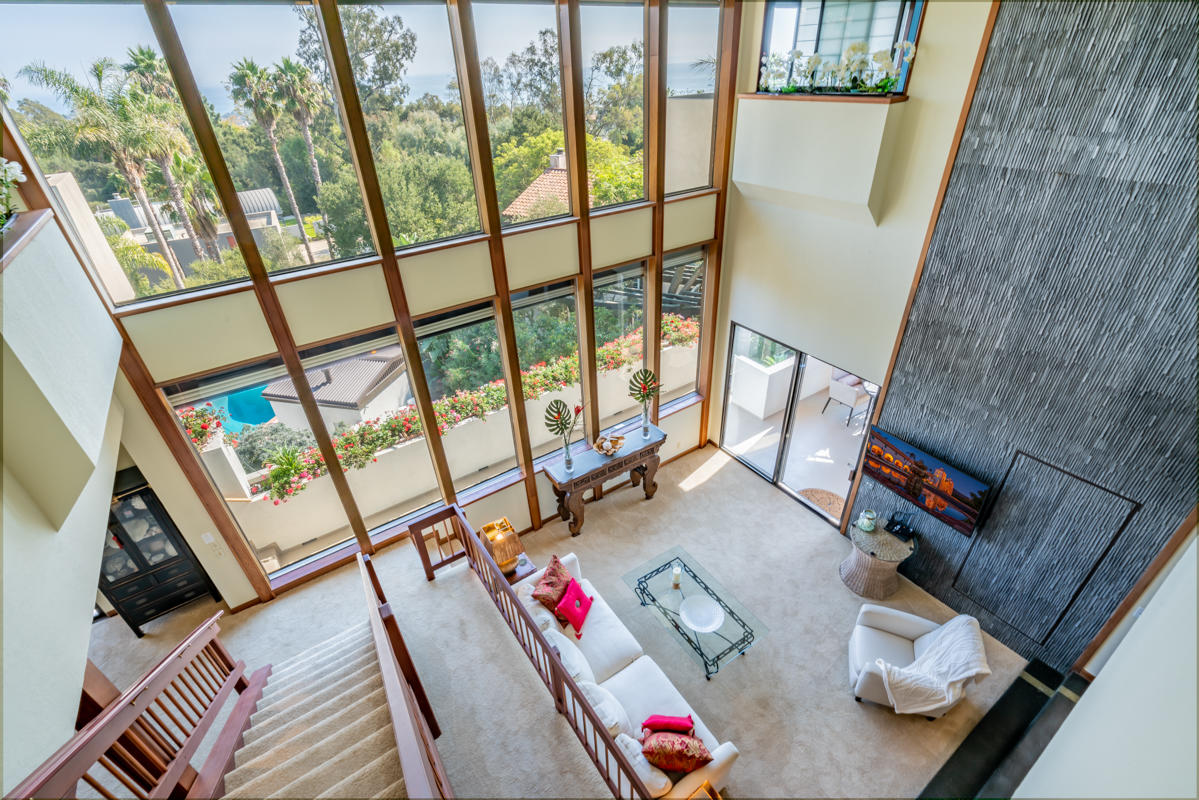 350 Las Alturas Road Santa Barbara, CA 93103 - Photo 4 of 49 a living room with furniture and a floor to ceiling window