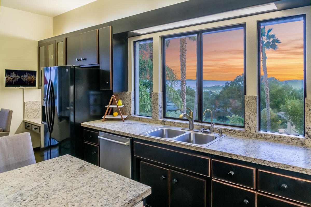 350 Las Alturas Road Santa Barbara, CA 93103 - Photo 5 of 49 a kitchen with a sink stove and refrigerator