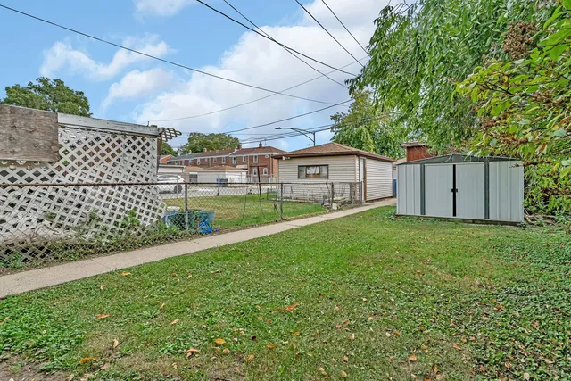 a view of a backyard with a garden