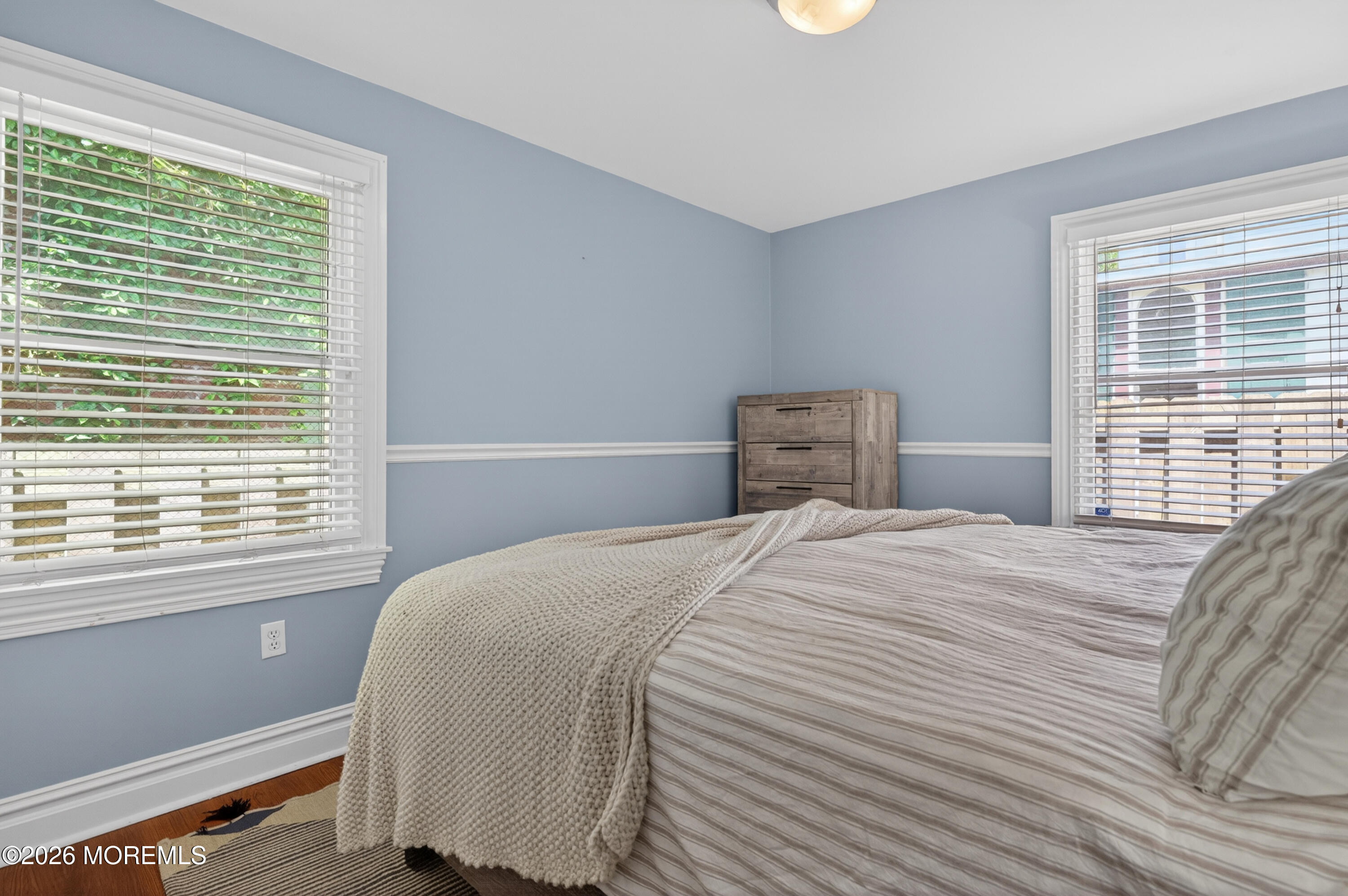 65 Heck Avenue Ocean Grove, NJ 07756 - Photo 23 of 37 a bedroom with a bed and a window