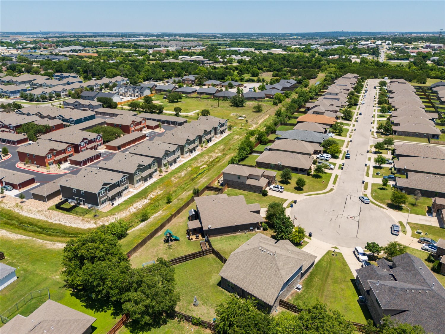 717 Kaluga Trail Leander, TX 78641 - Photo 36 of 40 an aerial view of residential houses with outdoor space