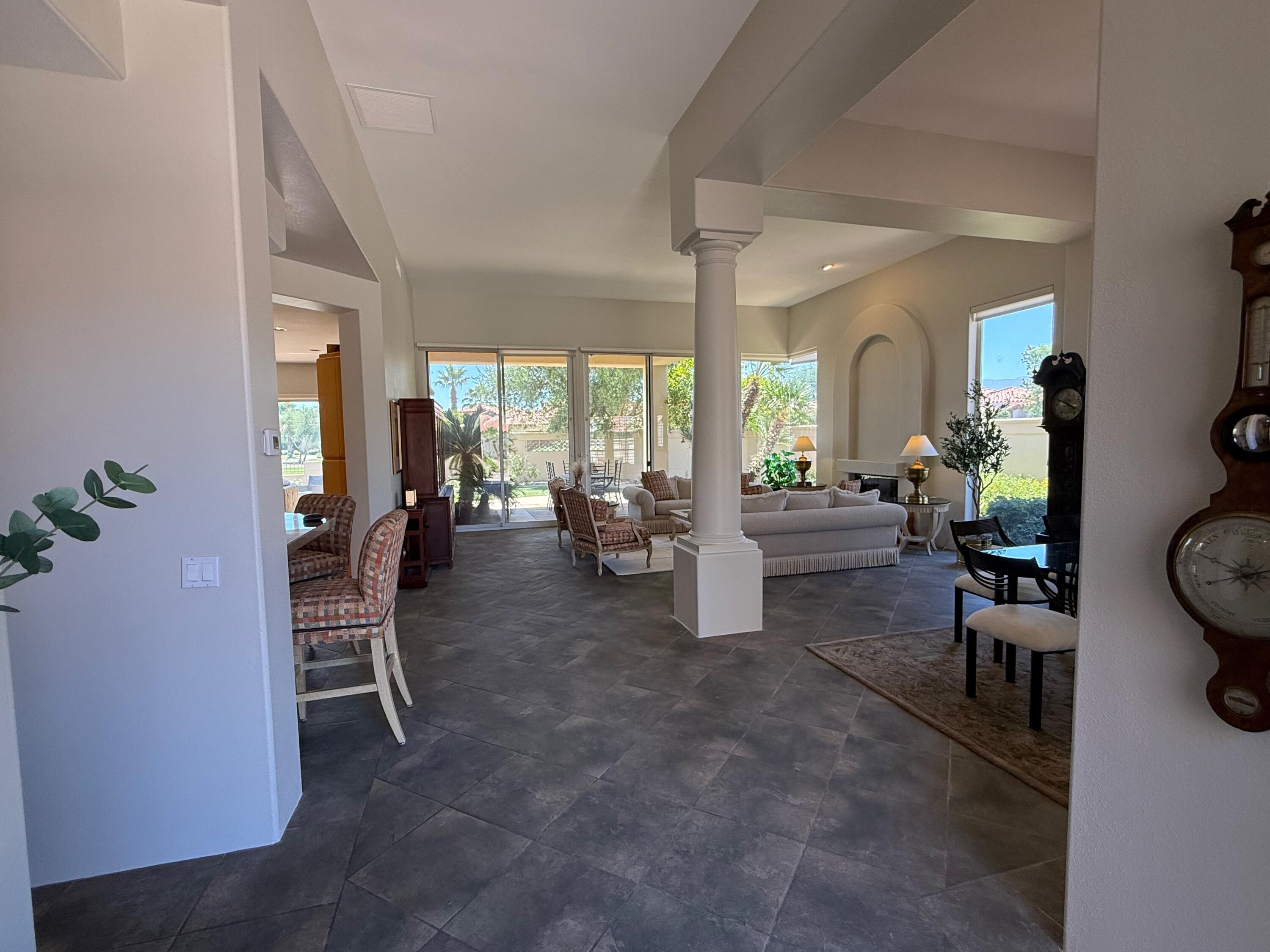 79765 Tangelo La Quinta, CA 92253 - Photo 11 of 55 a view of a livingroom with furniture and windows