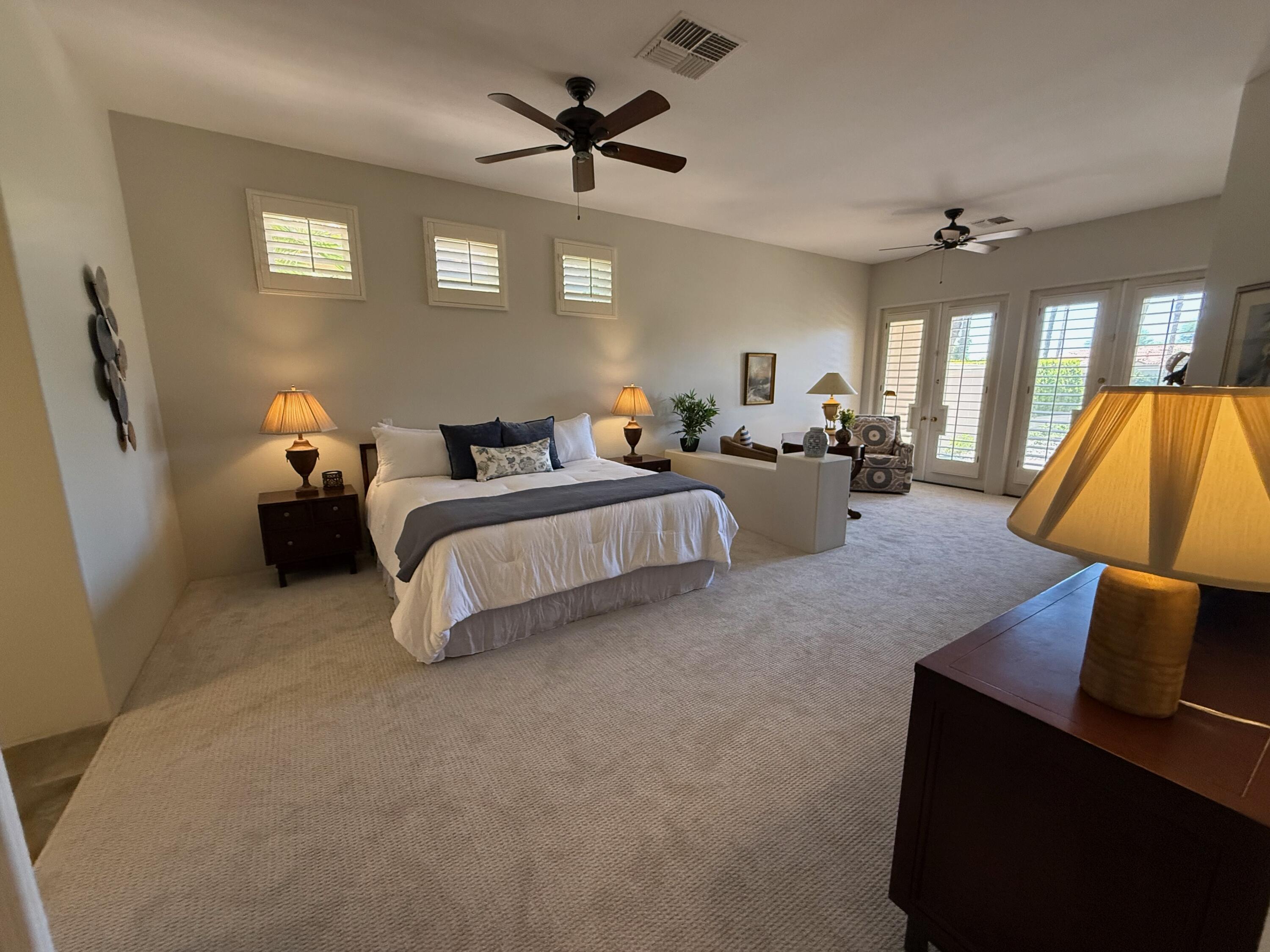 79765 Tangelo La Quinta, CA 92253 - Photo 38 of 55 a bed room with bed and window