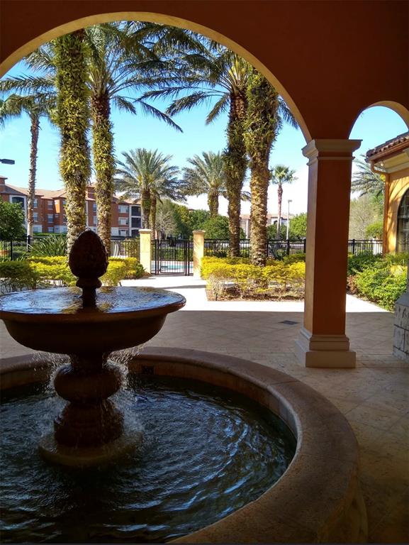6137 Metrowest Boulevard, Unit 307 Orlando, FL 32835 - Photo 20 of 28 a view of swimming pool from a patio