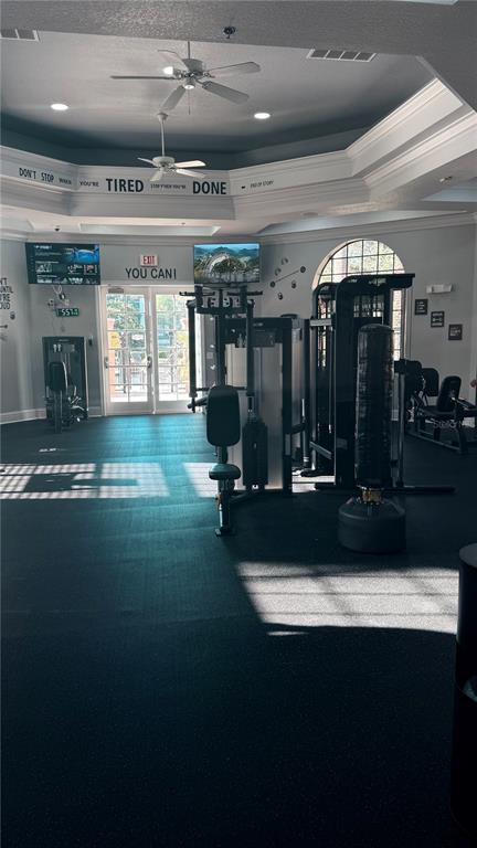 6137 Metrowest Boulevard, Unit 307 Orlando, FL 32835 - Photo 26 of 28 a view of a room with gym equipment